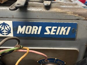 Mori Seiki manufacturer badge and headstock controls