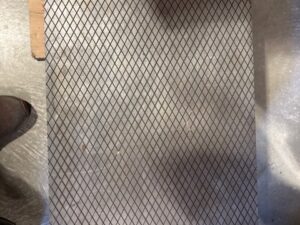 Rectangular lapping plate with a crosshatched grooved surface