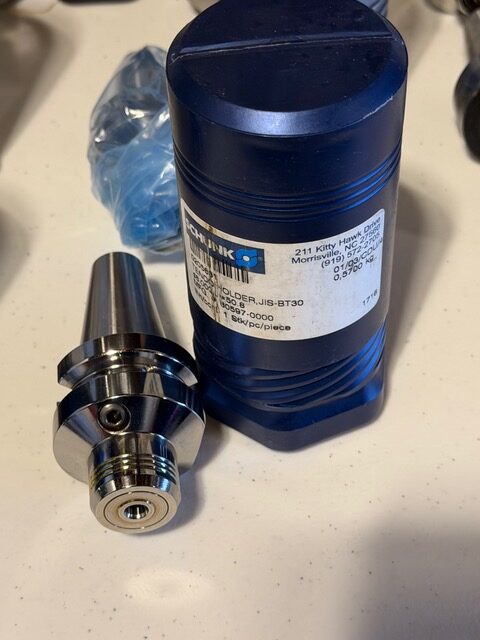 Close-up of another SCHUNK tool holder and its packaging label