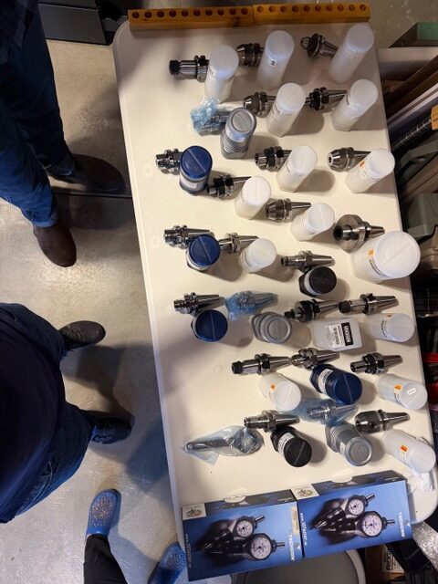 Overhead view of additional tool holders and packaged accessories