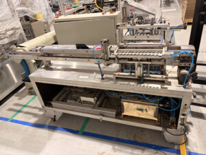 Yu Hao L-822N Lipstick Filling Machine, source machine 3, shown in the supplier photograph.