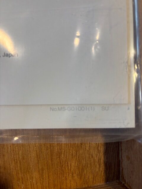 Close-up of the paperwork accompanying the Mitutoyo Height Master