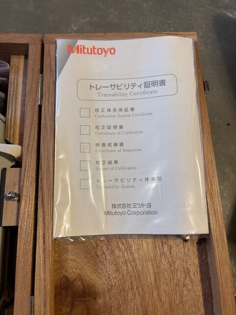 Mitutoyo paperwork stored inside the Height Master wooden case