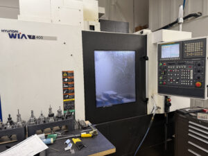 2015 Hyundai WIA F400 CNC vertical machining center — front view and fanuc control