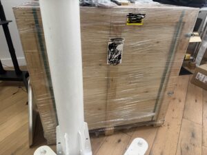 Seller-supplied photograph of the unopened wooden shipping crate for the Unitree G1-D-U6 robot; robot itself is not visible.
