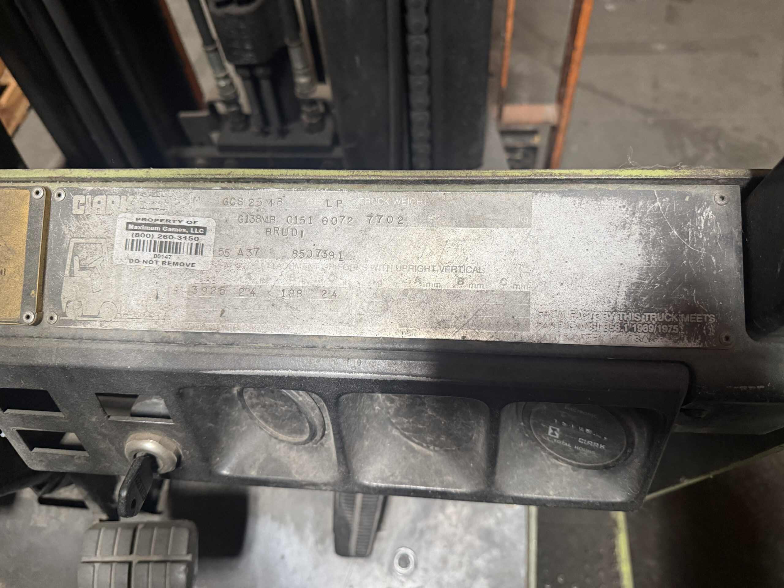 Clark GCS25MB forklift identification plate showing model and LP fuel